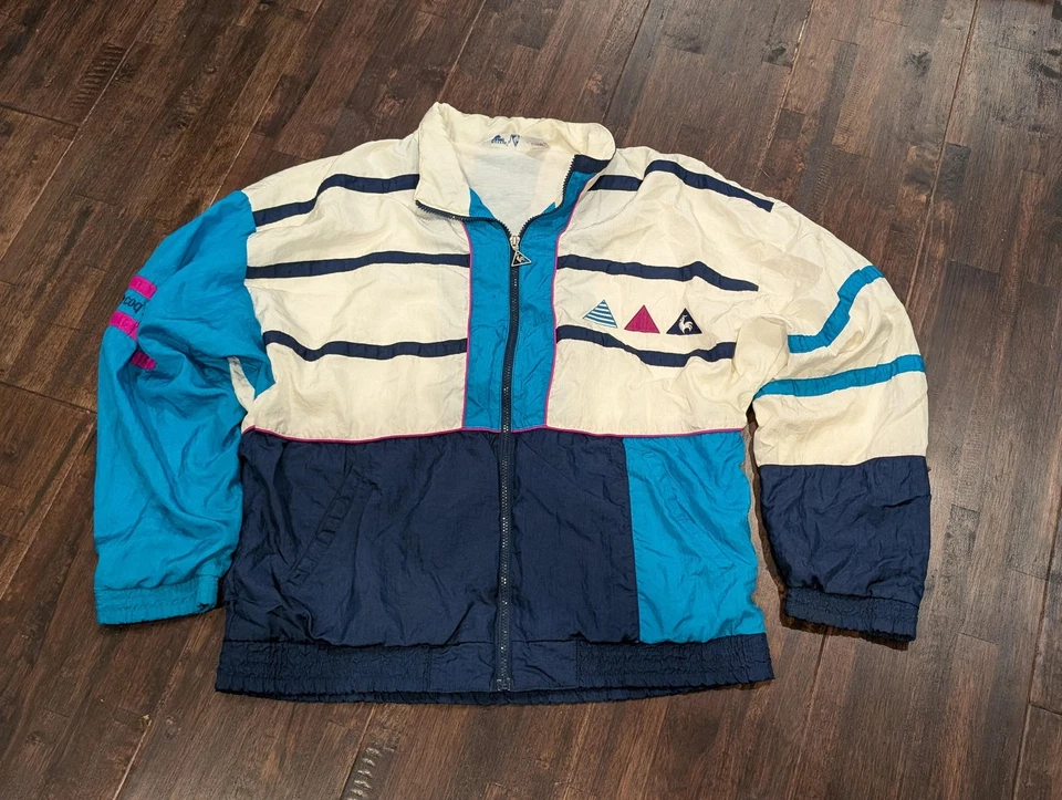 Chaqueta cortavientos vintage Le Coq Sportif para hombre grande de nailon bloques de colores años 90 Foto 1 de 4