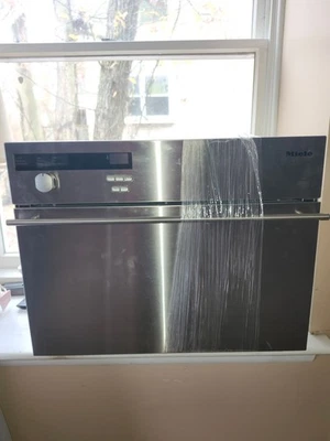 Horno de vapor de convección incorporado Miele modelo DG 155 acero inoxidable 24” NUEVO Foto 1 de 3