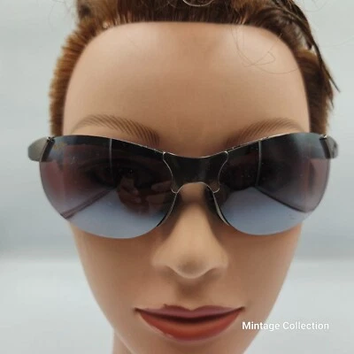 Gafas de sol vintage Maui Jim Sport Rocky Point marco de bronce sin montura lentes rosas Foto 1 de 4