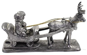 Estatuilla de paseo en trineo de reno de peltre macizo de 4 1/4" de largo vintage hecha en EE. UU. - Imagen 1 de 12