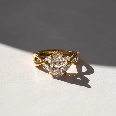 Pear Cut Solitaire Engagement Ring with Side Stones – Yellow Gold Plated - Image 1 of 4
