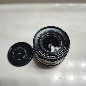 Konica Hexanon AR 28mm ƒ/3.5 Objektiv mit Rückdeckel + Metallkappe - Bild 1 von 7