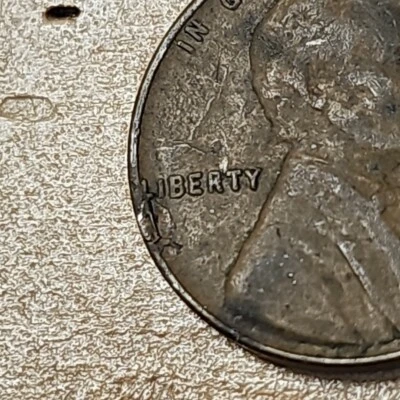 Centavo de trigo 1956 D error de laminación anverso *R51 Foto 1 de 3