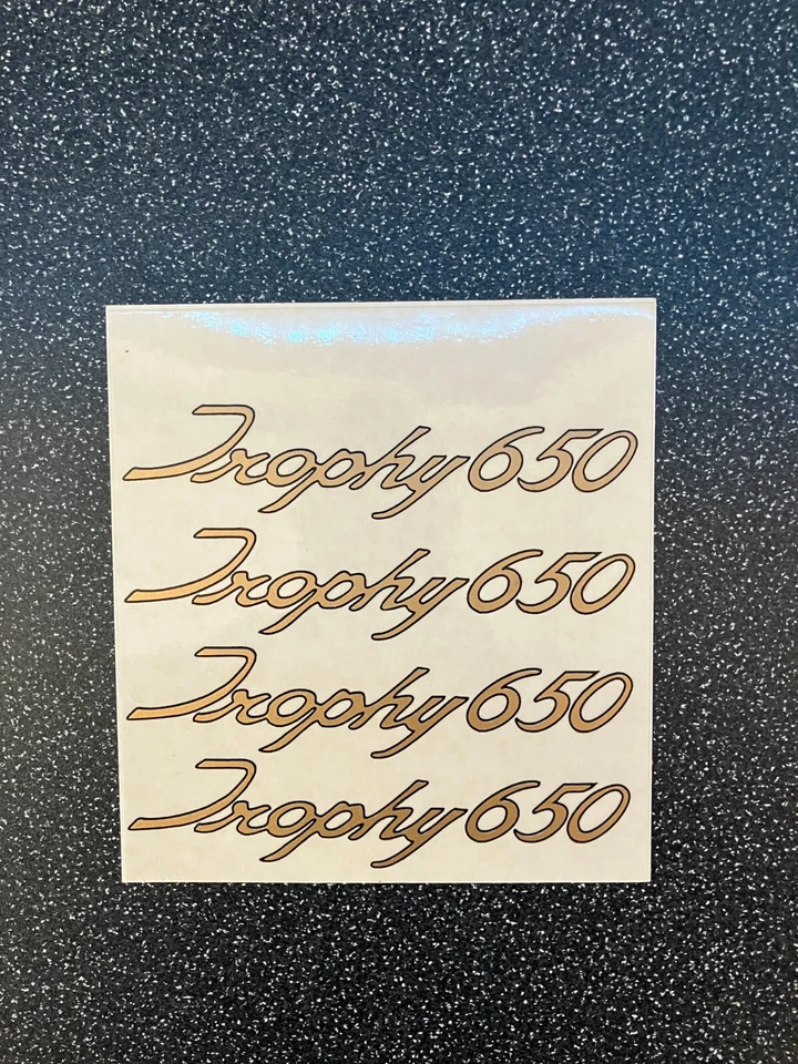 Triumph Tropy 650 - 4x vinyl self adhesive sheet 100x125mm (Gold Black on clear) - Image 1 of 1