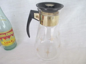 VINTAGE Corning Ware 6 tazze STAR BURST caraffa caffè resistente al calore con coperchio in PLASTICA - Foto 1 di 7