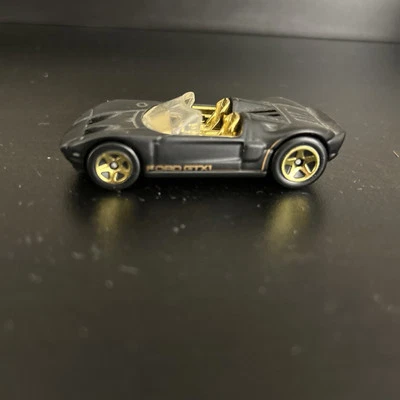 Hot Wheels Ford GTX-1 Ford Racing Flat Black Gold Interior 1:64 - Image 1 of 4
