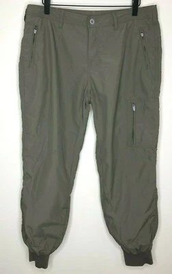 Pantalones de senderismo Gramicci para mujer talla 10 caqui bolsillos con cremallera puños acanalados al tobillo Foto 1 de 4