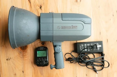 NEEWER Vision 5 TLL Strobe: Canon or Nikon + battery, charger, & remote trigger - Image 1 of 4
