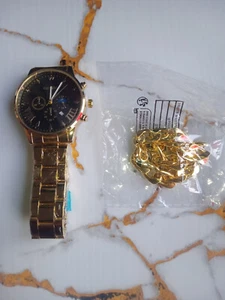 Mega Coole Golden Watch with Gold & Black Face and Gold Armband - Bild 1 von 3