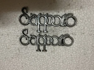 Plymouth Sapporo 1980 guardabarros emblema OEM - Imagen 1 de 5
