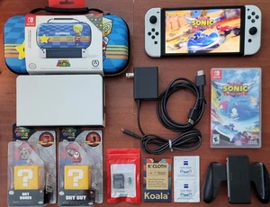 Switch OLED Konsole Nintendo mit 128GB SD + Joy-Cons + Dock + Sonic Racing + Case - Bild 1 von 7