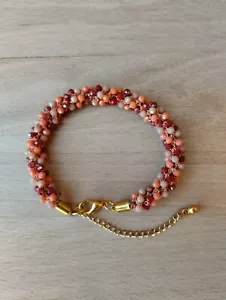 Bracciale uncinetto tubolare con filo lurex e cristalli rosso/arancio - Foto 1 di 6