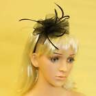 Fascinator in black sinamay on headband with feather tendrils