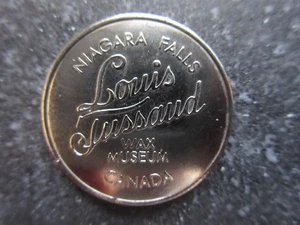 Ficha de buena suerte del Museo de Cera Louis Tussaud de las Cataratas del Niágara Canadá - Imagen 1 de 2