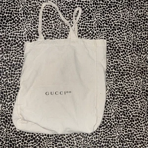 Gucci 100 Anniversary Tote Staubbeutel, Farbe Natur Baumwolle - Bild 1 von 4