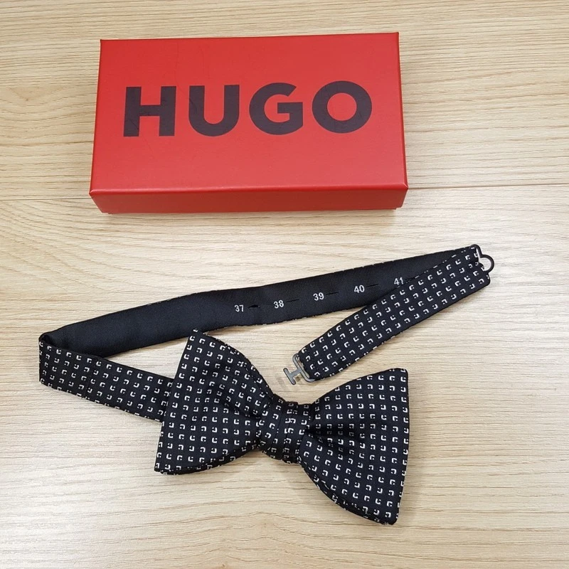 Pajarita HUGO BOSS para hombre negra geo 100 % seda preatada Foto 1 de 4