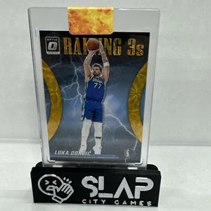 2023-24 Panini Donruss Optic Raining 3s ORO #15 Luka Dončić/10 - Imagen 1 de 8
