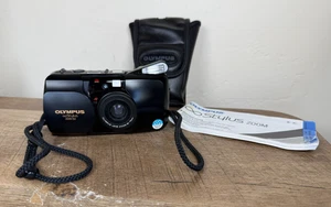 Olympus STYLUS ZOOM FOTOCAMERA DLX pellicola nera 35mm SOLO PARTI LEGGERE - Foto 1 di 6