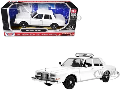 1986 DODGE DIPLOMAT POLICE UNMARKED WHITE BUILDER'S KIT 1/24 BY MOTORMAX 76475 - Image 1 of 4