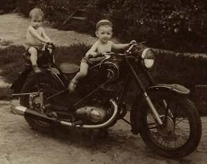 BABES ON A BIKE : TWO VERY YOUNG KIDS ON A LARGE MOTORCYCLE IN THE UKRAINE - Picture 1 of 3