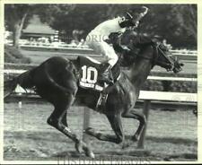 Press Photo Race horse #10 Thunder Rumble crosses finish line with Herb McCauley