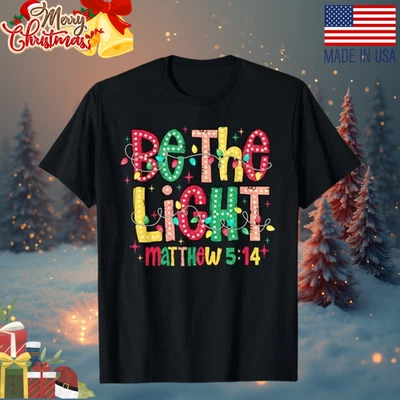 Be The Light Christian Navidad Camiseta Hecha por Abanicos Holiday Faith Unisex Camiseta S-5XL Foto 1 de 3