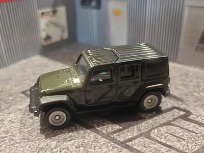 Jeep Wrangler Tomica Nº 80 2015 verde 1:65 suelto usado Foto 1 de 4