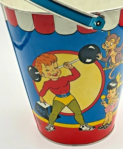 Ohio Art Tin Litho Sand Pail Circus Majorette Monkey Weight Lifter Dogs Cowboy - Picture 1 of 7