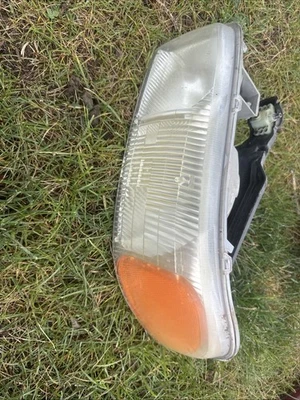 1999-2007 GMC Sierra Yukon Driver Left Headlight Housing + Headlight Bracket - Image 1 of 4