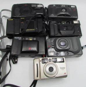 Posten von sieben analogen Kompaktkameras 35 mm NUR FÜR ERSATZTEILE/REPARATUR Kodak Minolta - Bild 1 von 22
