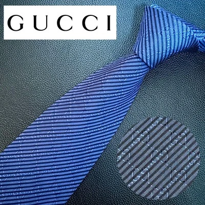 Nueva Corbata Gucci Sin Usar Azul Marino Rayas 100% Seda Hecha en Italia Foto 1 de 4