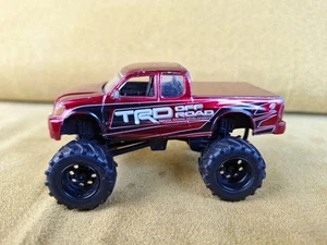 Jada 2011 #009 Bigtime 4 Wheelin' 2006 Toyota Tundra Metallic Red - Picture 1 of 13