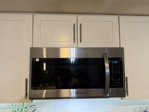 Samsung 30 in. W 1.7 cu. ft. Over the Range Microwave (Stainless) Slightly Used - Picture 1 of 5