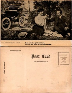 Escena de picnic de niña y hombre postal de 1907 con coche y sombrero - Imagen 1 de 1