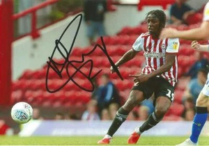 BRENTFORD: ROMAINE SAWYERS SIGNED 6x4 ACTION PHOTO+COA - Picture 1 of 1