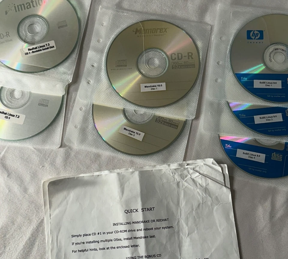 LOT of Three Linux OS - Redhat Linux 7.3 - Mandrake 10.0 - SuSE Linux 9.0 - CDR - Image 1 of 4
