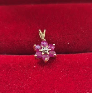 Stunning 9ct Diamond and Ruby Flower Pendant  preloved Hallmarked - Picture 1 of 3