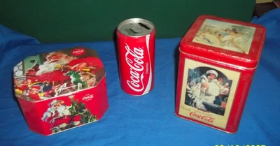 Lot of 4 Coca Cola Tins (one is a bank and one contains a puzzle) - Image 1 of 4