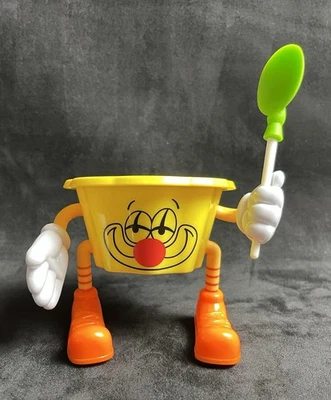 Taza de helado payaso circo amarillo Alcas Joyoso con cuchara | brazos y piernas móviles de 4 oz Foto 1 de 4