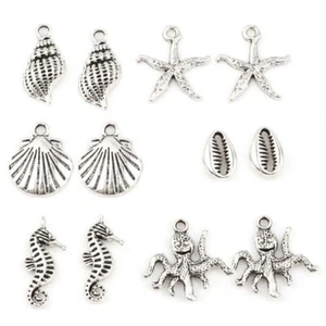 12 Mixed Sealife Shaped Silver Tone Charm Pendants Seahorse, Shell, Octopus - Bild 1 von 1