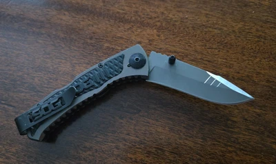 Cuchillos SOG deslizamiento lateral, bloqueo asistido. Foto 1 de 4