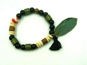 MEHRFARBIGES PERLEN FREUNDSCHAFT STRETCH ARMBAND MIT BLATT & SCHWARZER QUASTE - Bild 1 von 4