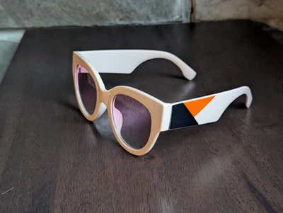 Gafas de sol rosa retro años 50 60 70 80 naranja negro geométricas Foto 1 de 4