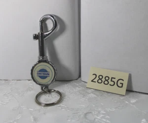 DATSUN PORTACHIAVI A FORMA DI TAPPO BOTTIGLIA CON PORTACHIAVI A MOLLA, CLIP E APRIBOTTIGLIE - Foto 1 di 7