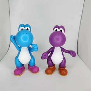 Figurine Jakks Nintendo Super Mario Yoshi blu o viola 4,5" vendute separatamente  - Foto 1 di 11