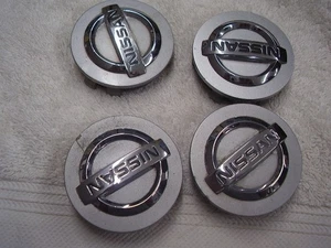 NISSAN WHEEL CENTERS ALTAMA OTHERS ALL 4 FREE POSTAGE - Picture 1 of 8