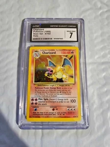 CHARIZARD 4/102 CGC 7 POKEMON - Picture 1 of 1