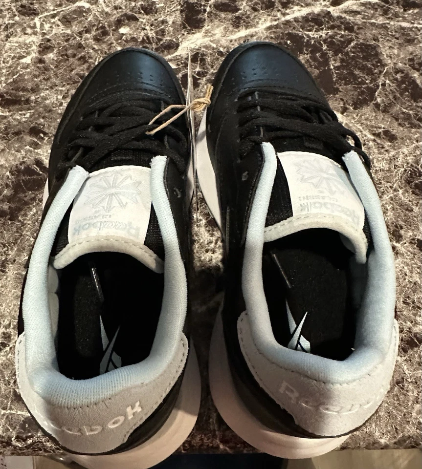 Zapatilla deportiva Reebok unisex clásica de cuero SP negra/azul cristal/blanca talla 4 niño grande Foto 1 de 4