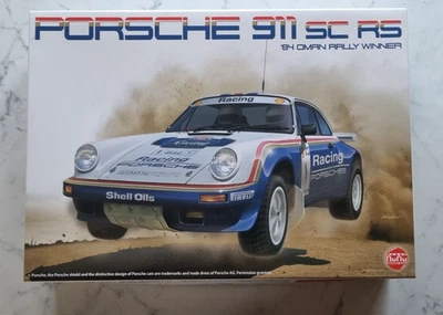NUNU Porsche 911 SC RS '84 OMAN RALLY WINNER PN24011 Kit 1/24 - Immagine 1 di 4