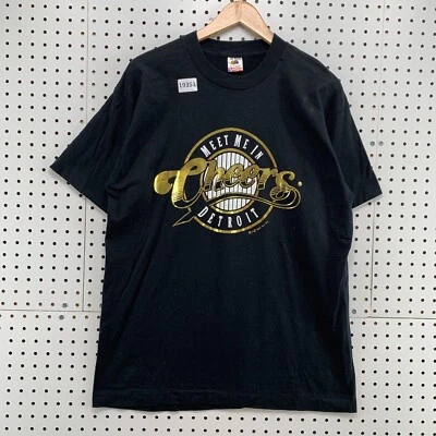 Camisa Cheers L anos 90 preta ponto único Meet Me In Detroit ouro metálico 21,5x29 - Imagem 1 de 4